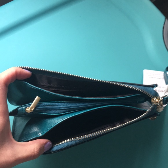Teal wristlet free with $30.00 purchase or can be purchased alone - Picture 2 of 2